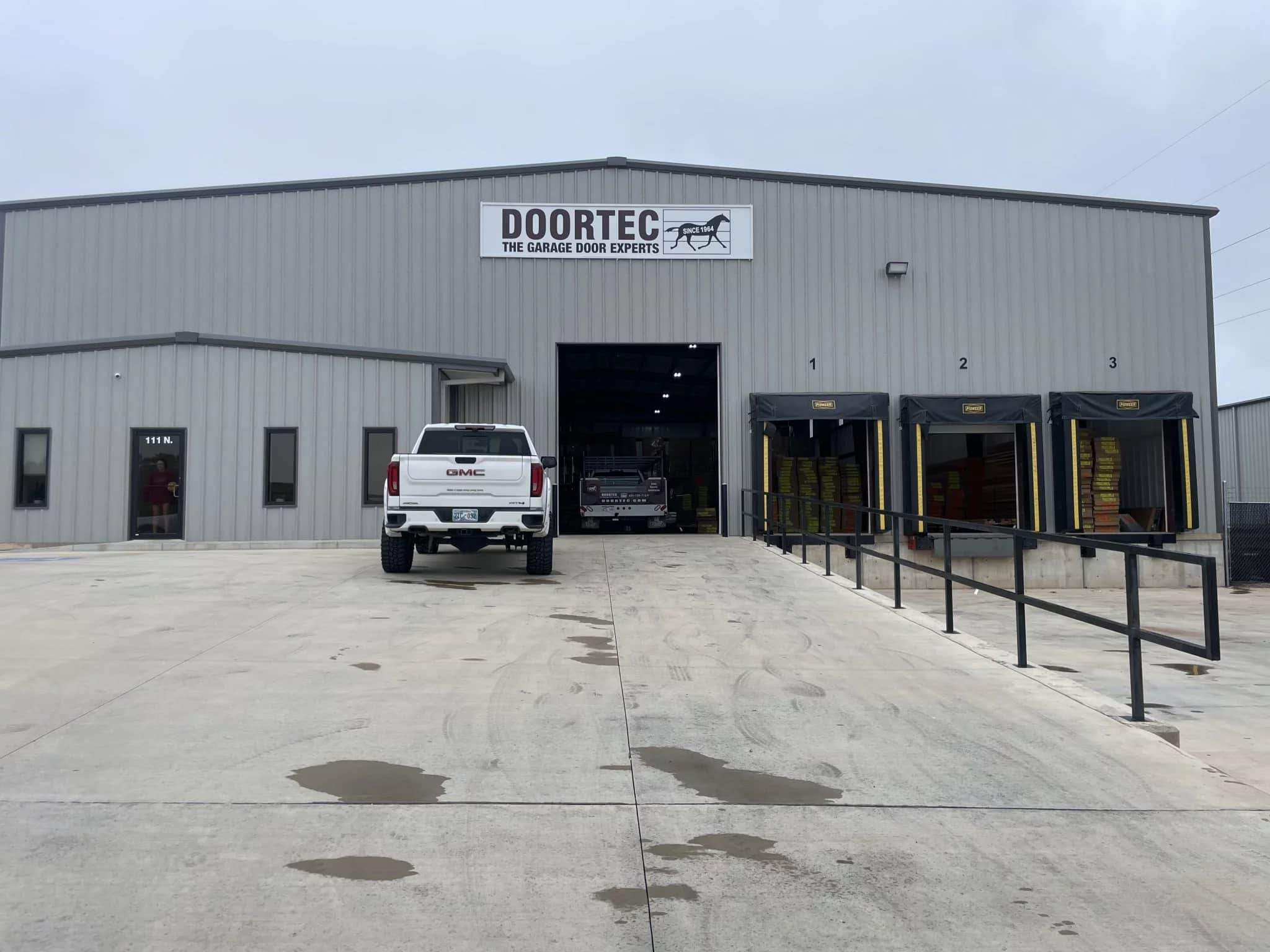 DOORTEC technician performing garage door repair in Oklahoma City