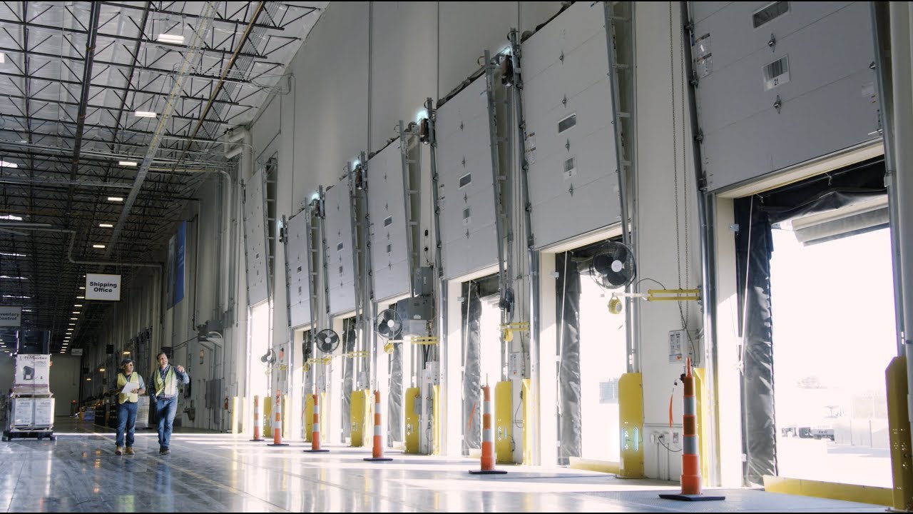 LiftMaster Model H Elite hoist commercial operator installed on rolling steel door